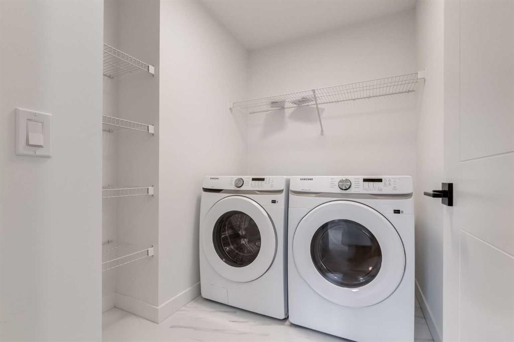86 Agate Road, Cochrane, AB - Indoor Photo Showing Laundry Room