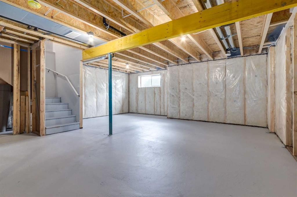 86 Agate Road, Cochrane, AB - Indoor Photo Showing Basement