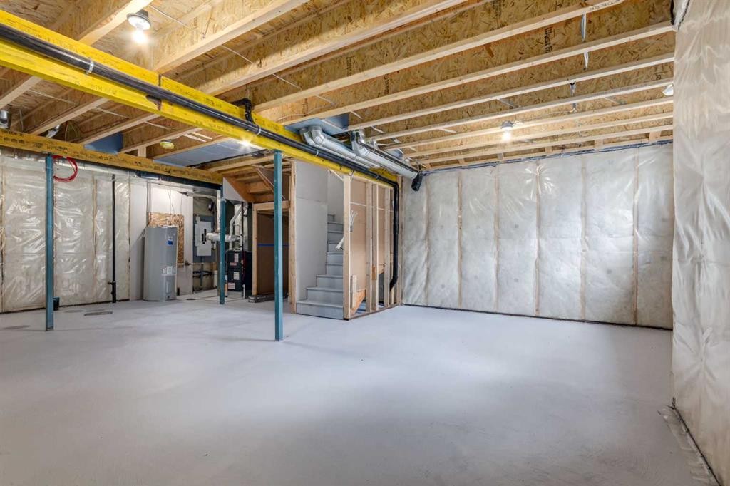 86 Agate Road, Cochrane, AB - Indoor Photo Showing Basement