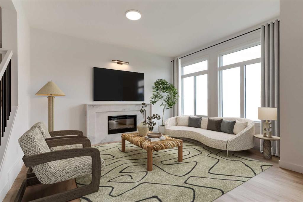 86 Agate Road, Cochrane, AB - Indoor Photo Showing Living Room With Fireplace