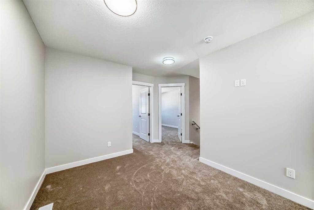 112 Belvedere Park Se, Calgary, AB - Indoor Photo Showing Other Room