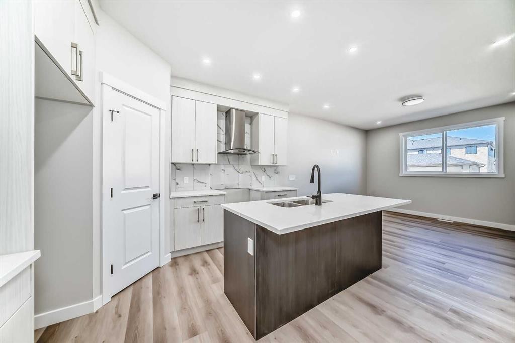 112 Belvedere Park Se, Calgary, AB - Indoor Photo Showing Kitchen With Double Sink
