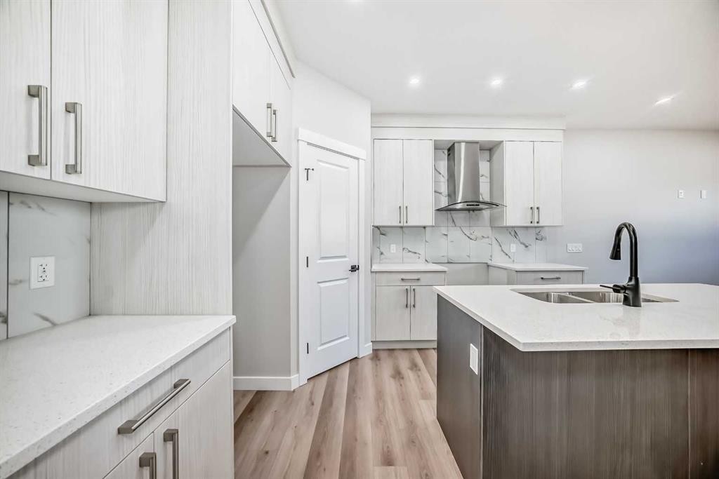112 Belvedere Park Se, Calgary, AB - Indoor Photo Showing Kitchen With Double Sink