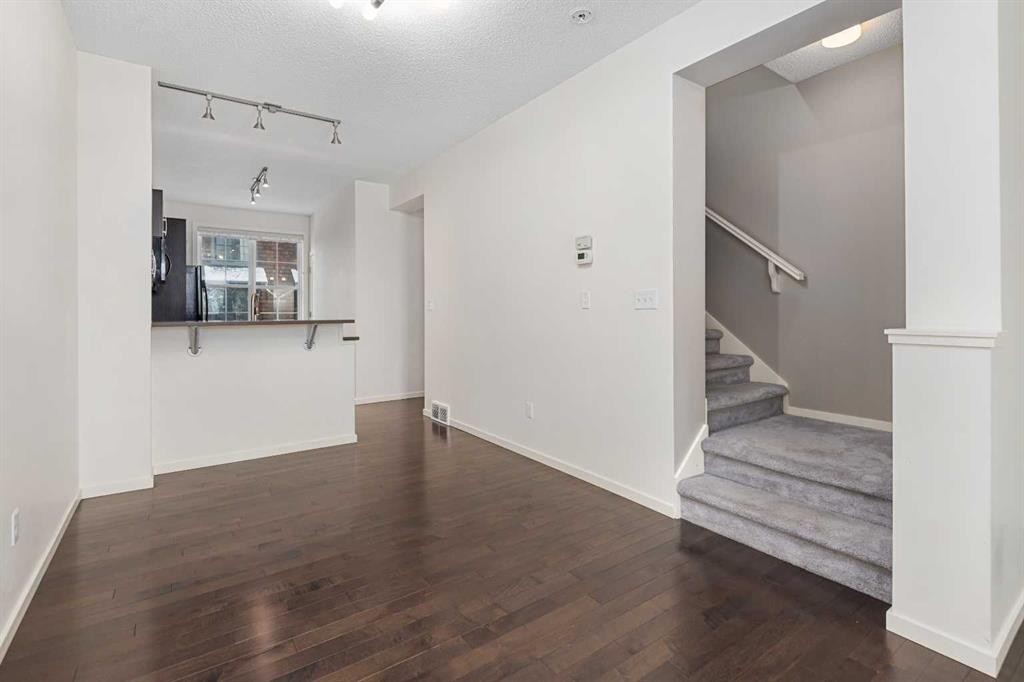 111 Ascot Point Sw, Calgary, AB - Indoor Photo Showing Other Room
