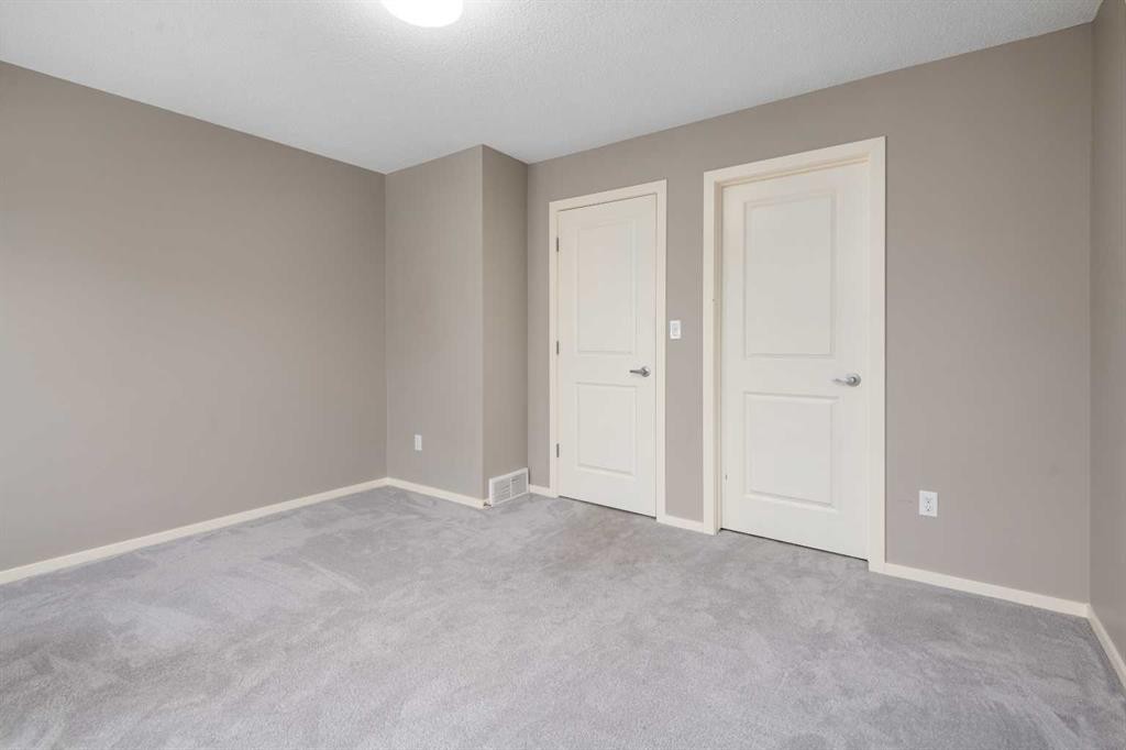 111 Ascot Point Sw, Calgary, AB - Indoor Photo Showing Other Room