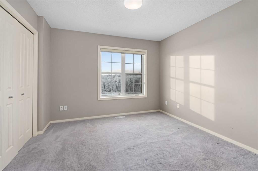 111 Ascot Point Sw, Calgary, AB - Indoor Photo Showing Other Room