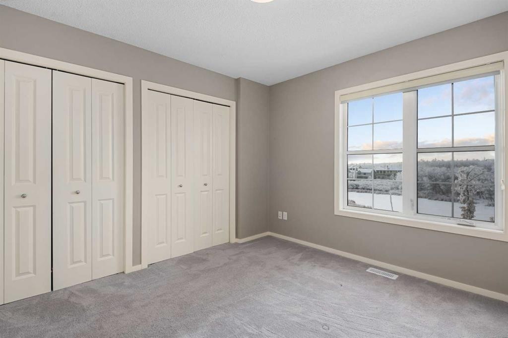 111 Ascot Point Sw, Calgary, AB - Indoor Photo Showing Other Room