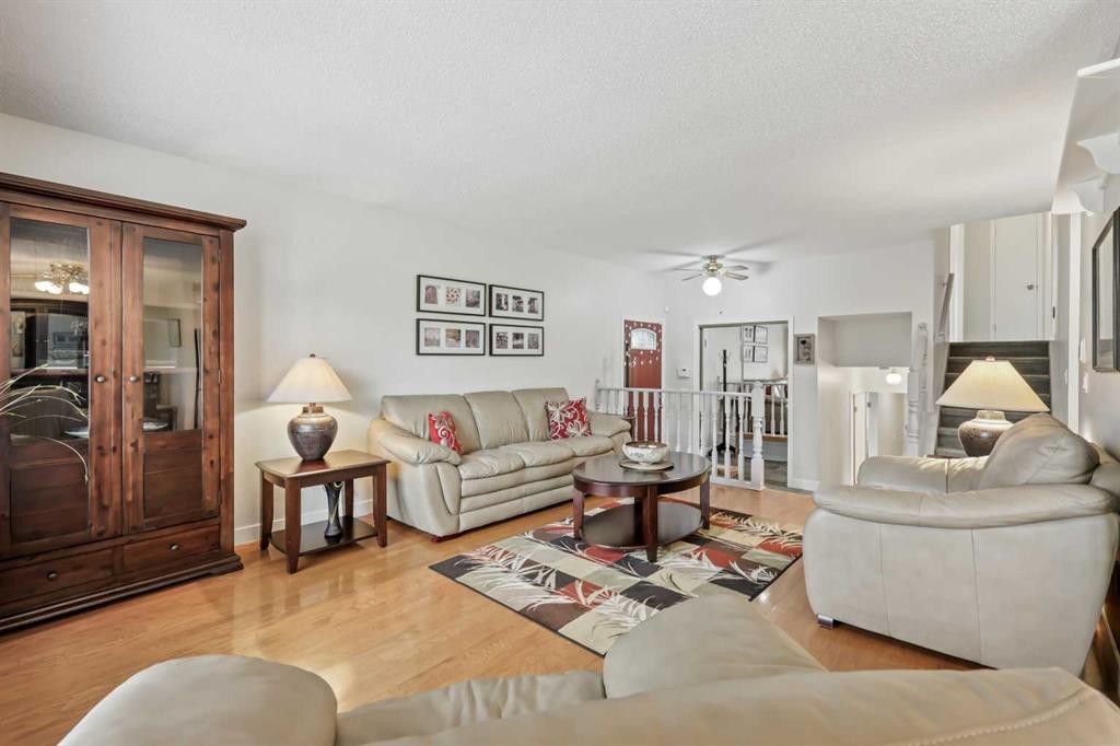 103 Sandarac Place Nw, Calgary, AB - Indoor Photo Showing Living Room