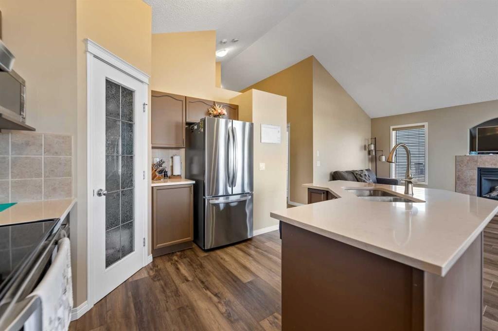 8 Copperfield Manor Se, Calgary, AB - Indoor Photo Showing Kitchen With Stainless Steel Kitchen With Double Sink