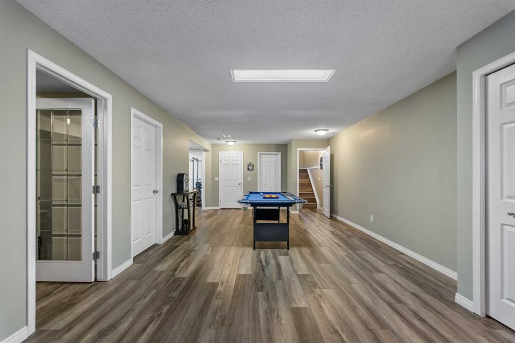 8 Copperfield Manor Se, Calgary, AB - Indoor Photo Showing Other Room