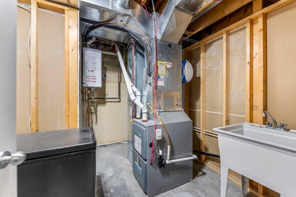 8 Copperfield Manor Se, Calgary, AB - Indoor Photo Showing Basement