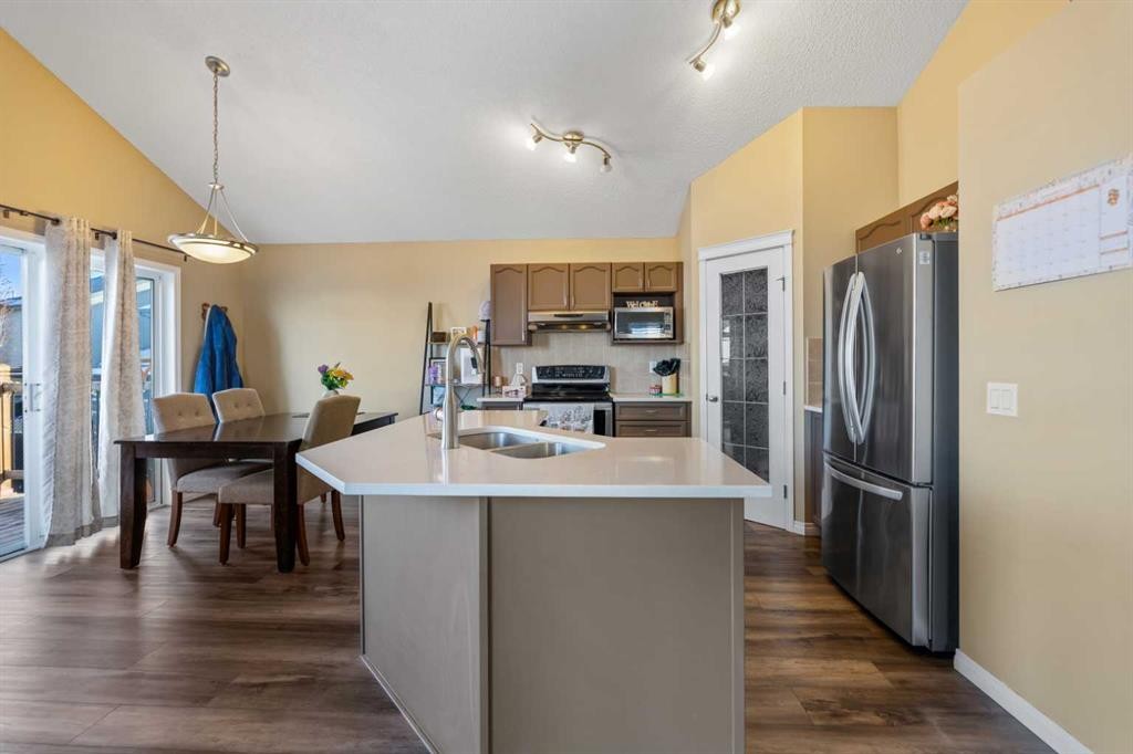 8 Copperfield Manor Se, Calgary, AB - Indoor Photo Showing Kitchen With Double Sink