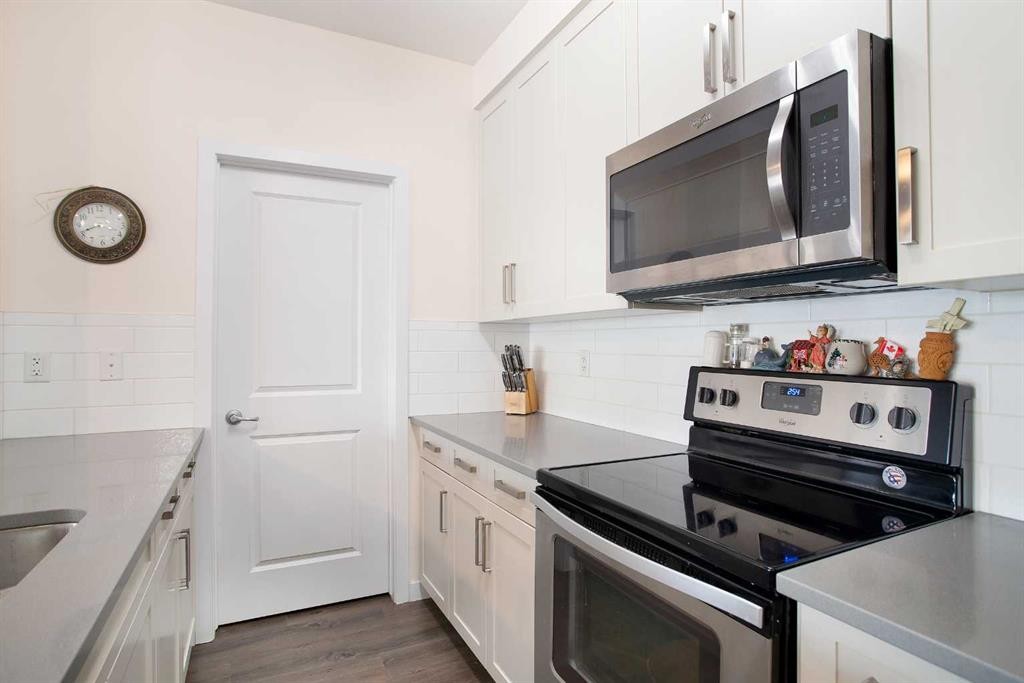 103-200 Cranfield Common Se, Calgary, AB - Indoor Photo Showing Kitchen