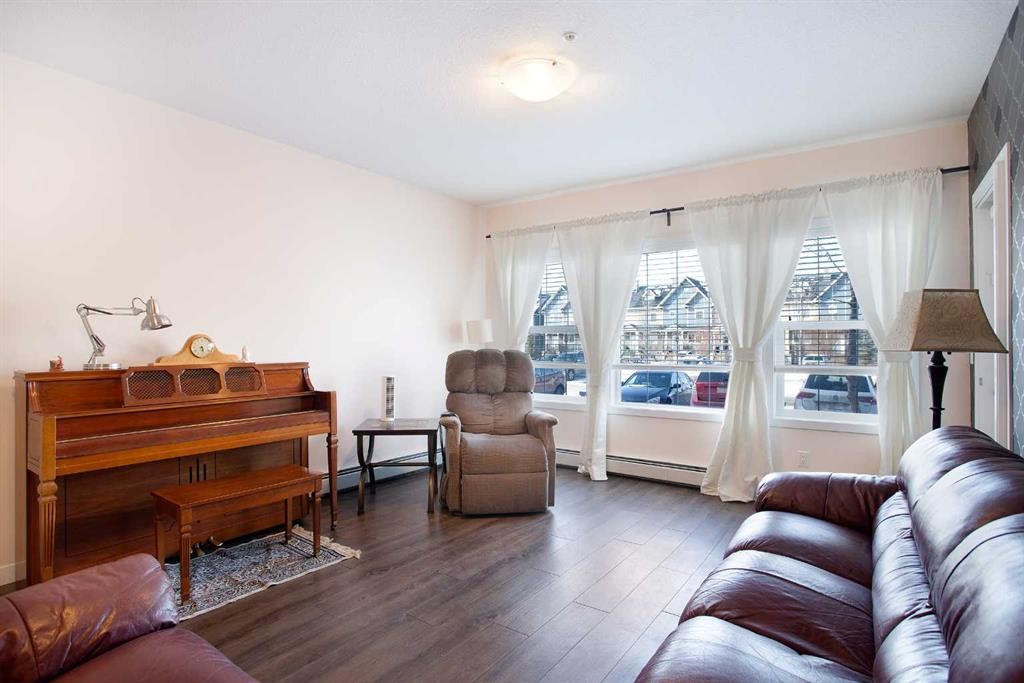 103-200 Cranfield Common Se, Calgary, AB - Indoor Photo Showing Living Room
