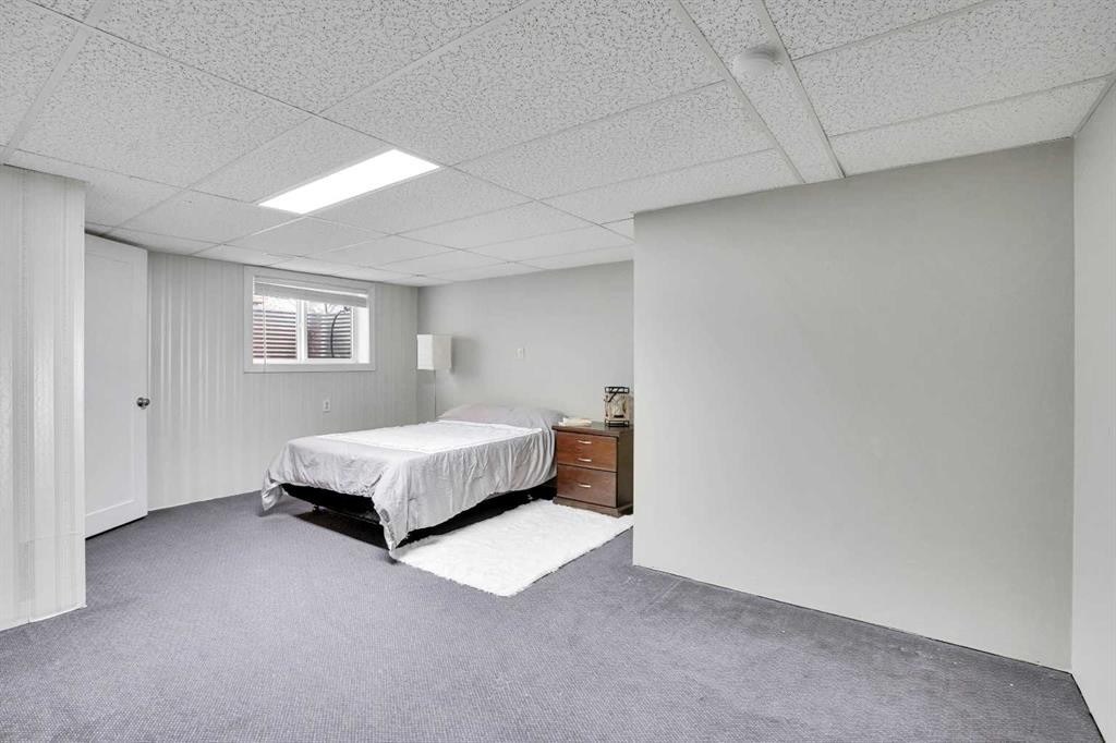 14691 Deer Ridge Drive Se, Calgary, AB - Indoor Photo Showing Bedroom