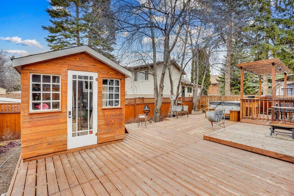 14691 Deer Ridge Drive Se, Calgary, AB - Outdoor With Deck Patio Veranda With Exterior