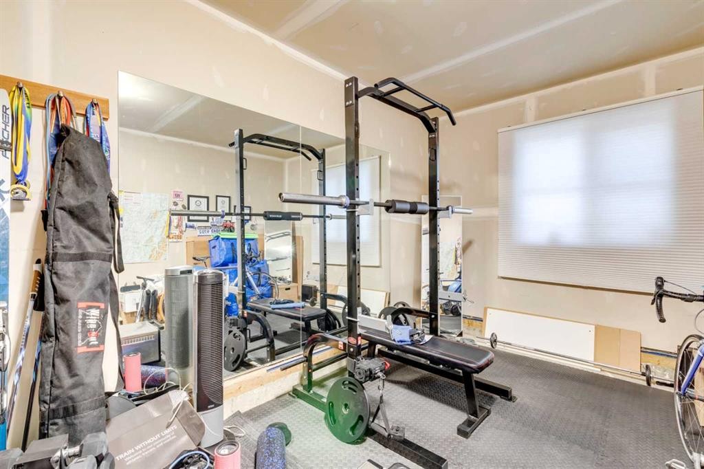 180 Walden Path Se, Calgary, AB - Indoor Photo Showing Gym Room