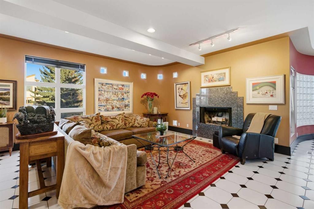 64 Patterson Mews Sw, Calgary, AB - Indoor Photo Showing Living Room With Fireplace