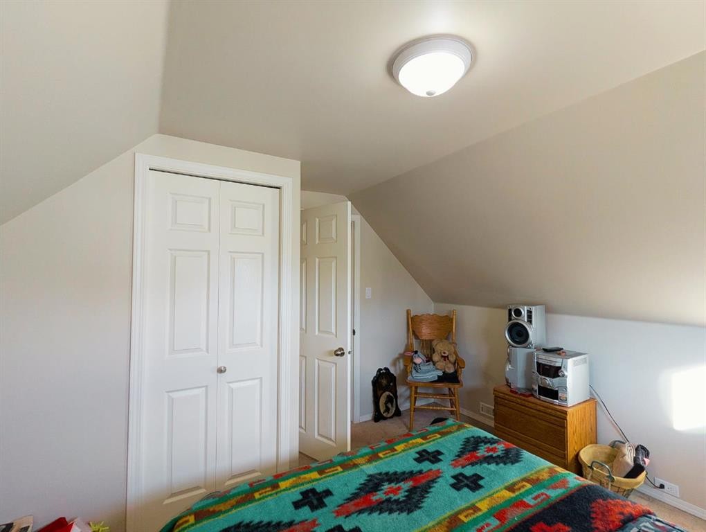 119 47 Avenue West, Claresholm, AB - Indoor Photo Showing Bedroom