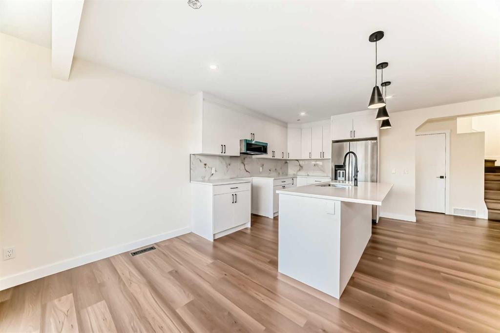 936 Cranston Drive Se, Calgary, AB - Indoor Photo Showing Kitchen
