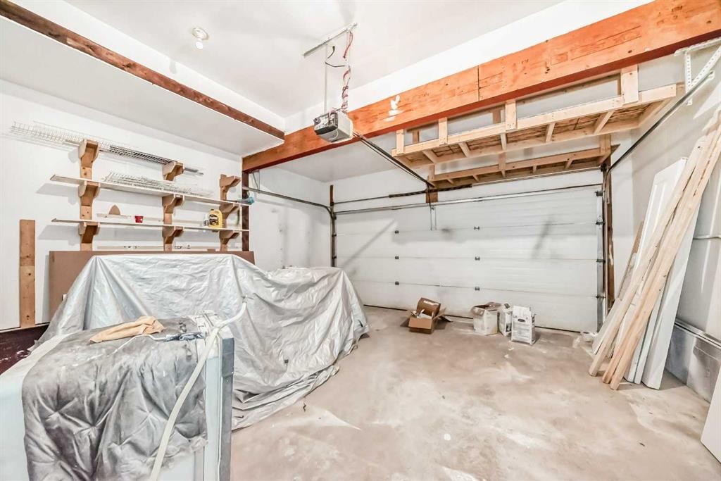 936 Cranston Drive Se, Calgary, AB - Indoor Photo Showing Garage