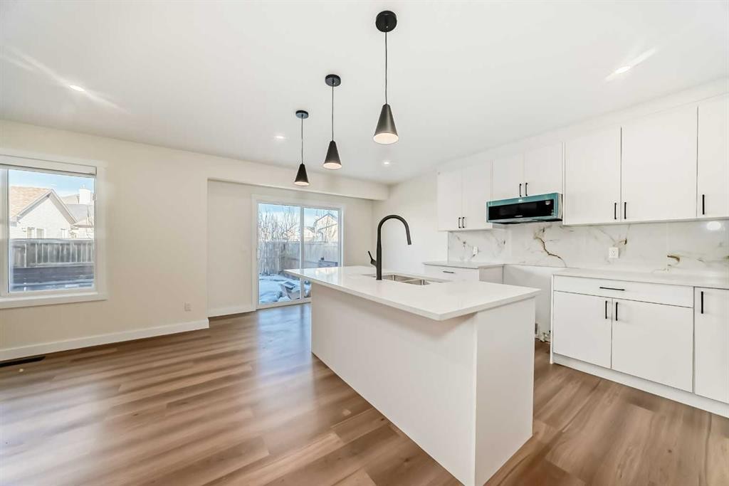 936 Cranston Drive Se, Calgary, AB - Indoor Photo Showing Kitchen