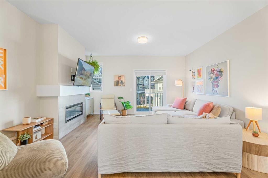 160 Copperleaf Way Se, Calgary, AB - Indoor With Fireplace