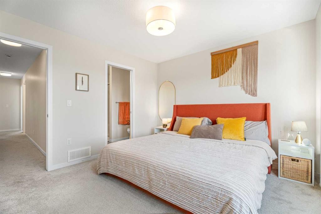 160 Copperleaf Way Se, Calgary, AB - Indoor Photo Showing Bedroom