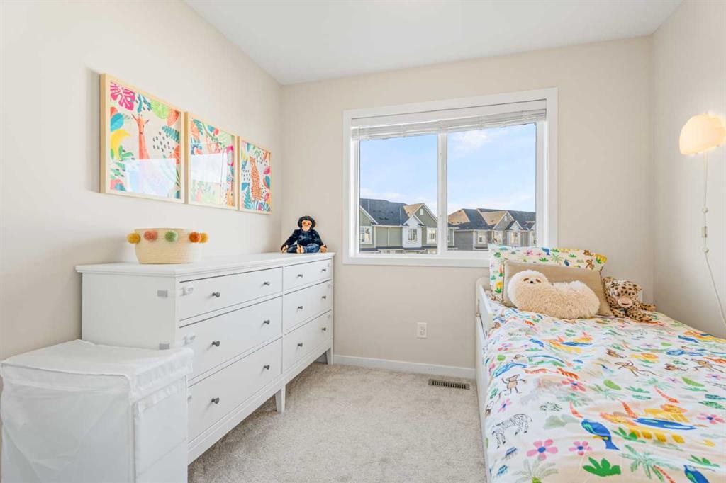 160 Copperleaf Way Se, Calgary, AB - Indoor Photo Showing Bedroom