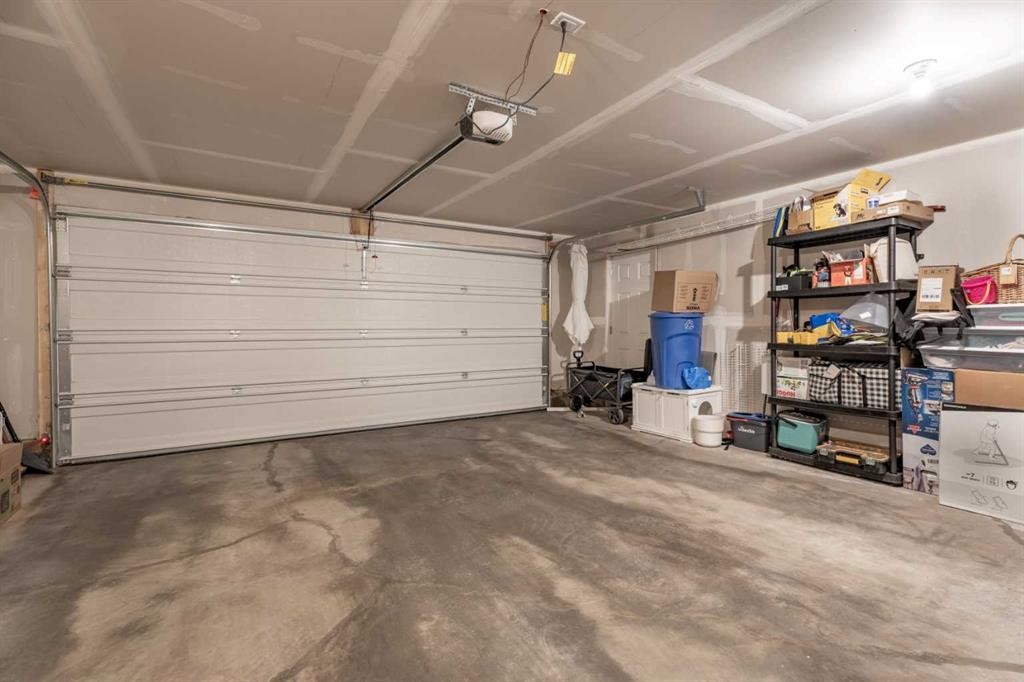 160 Copperleaf Way Se, Calgary, AB - Indoor Photo Showing Garage