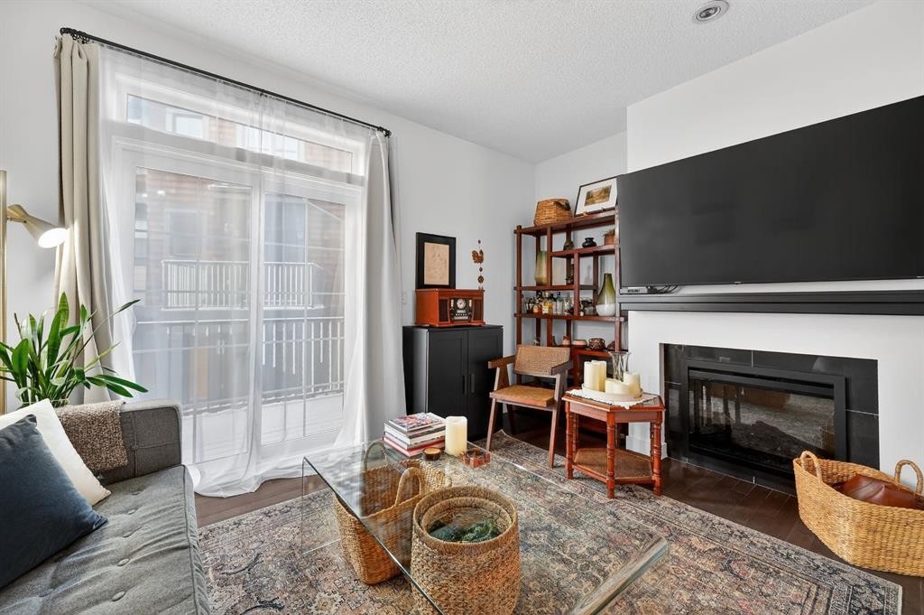 235 Ascot Circle Sw, Calgary, AB - Indoor With Fireplace