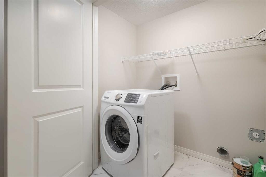 175 Howse Rise Ne, Calgary, AB - Indoor Photo Showing Laundry Room