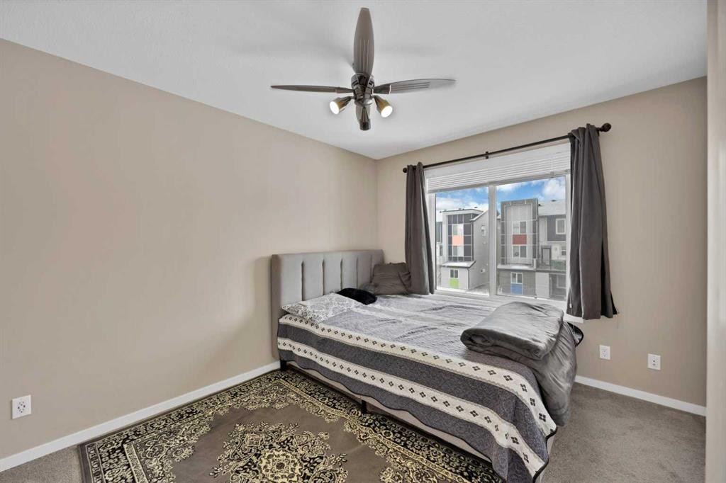 203-350 Redstone Ne, Calgary, AB - Indoor Photo Showing Bedroom