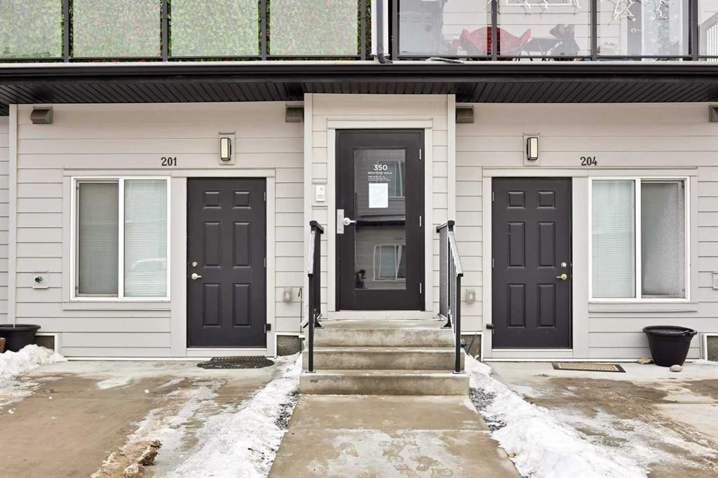 203-350 Redstone Ne, Calgary, AB - Outdoor With Facade