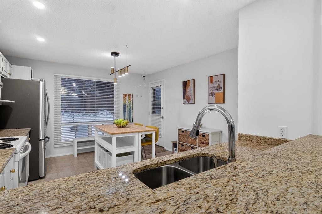 643 Strathcona Drive Sw, Calgary, AB - Indoor Photo Showing Kitchen With Double Sink