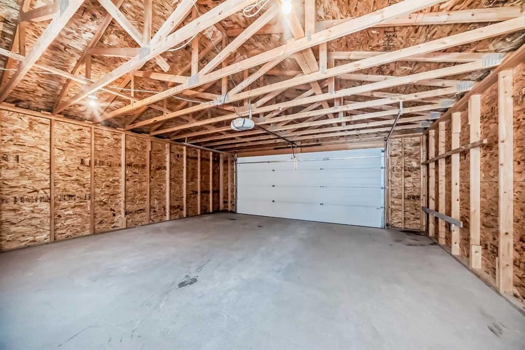 79 Saddlebrook Way Ne, Calgary, AB - Indoor Photo Showing Garage
