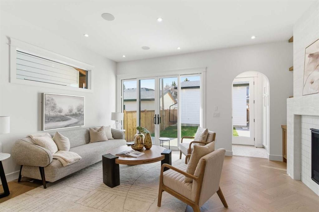 1739 48 Avenue Sw, Calgary, AB - Indoor Photo Showing Living Room With Fireplace