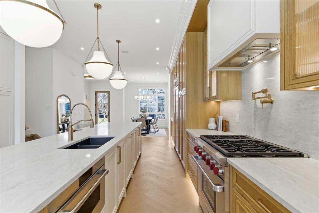 1739 48 Avenue Sw, Calgary, AB - Indoor Photo Showing Kitchen With Double Sink With Upgraded Kitchen