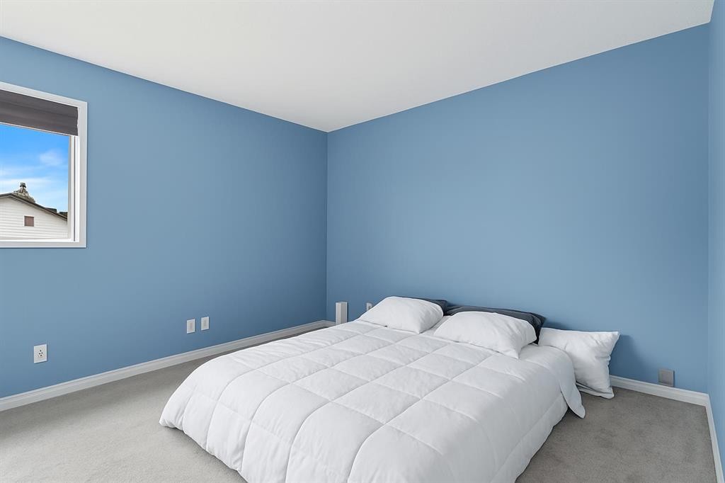 3-100 Pennsylvania Road Se, Calgary, AB - Indoor Photo Showing Bedroom