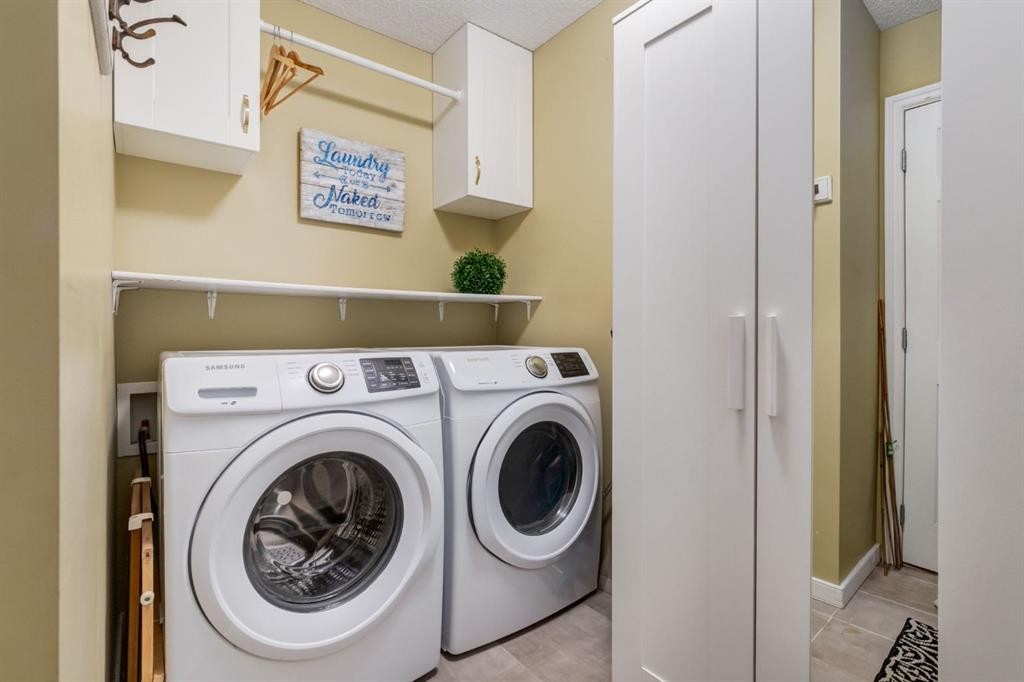 82 Cranwell Common Se, Calgary, AB - Indoor Photo Showing Laundry Room
