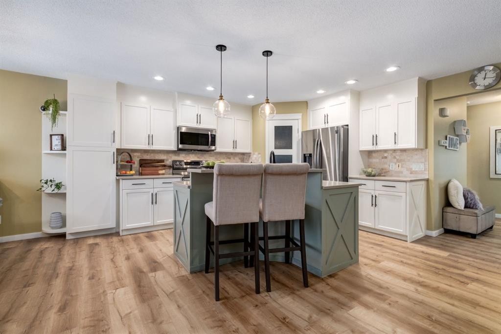 82 Cranwell Common Se, Calgary, AB - Indoor Photo Showing Kitchen With Stainless Steel Kitchen With Upgraded Kitchen