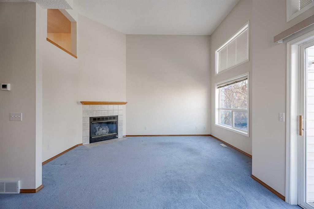 203 Anderson Grove Sw, Calgary, AB - Indoor With Fireplace