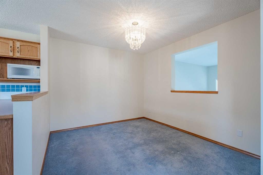 203 Anderson Grove Sw, Calgary, AB - Indoor Photo Showing Other Room