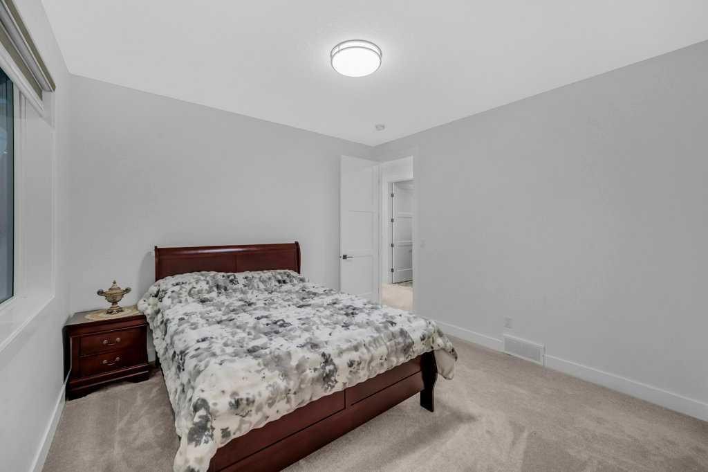 95 Saddlepeace Way Ne, Calgary, AB - Indoor Photo Showing Bedroom