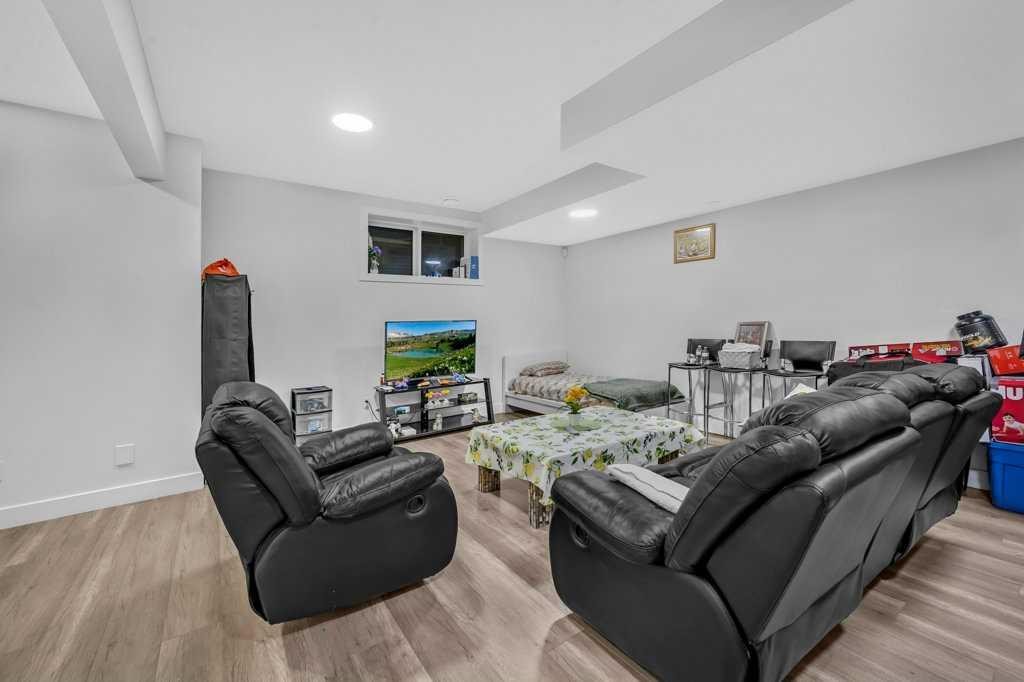 95 Saddlepeace Way Ne, Calgary, AB - Indoor With Fireplace