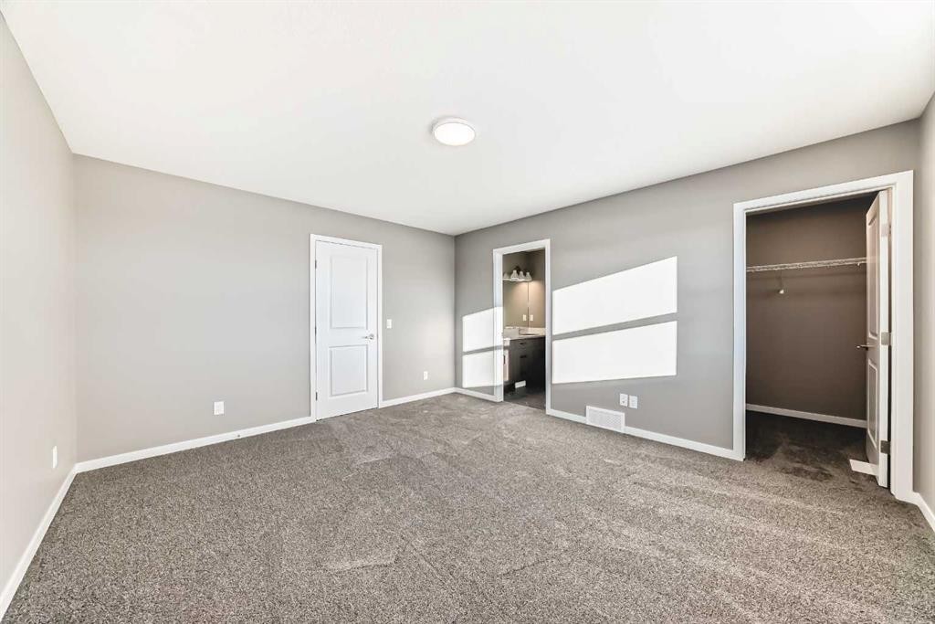 155 Sawgrass Gate Nw, Airdrie, AB - Indoor Photo Showing Other Room