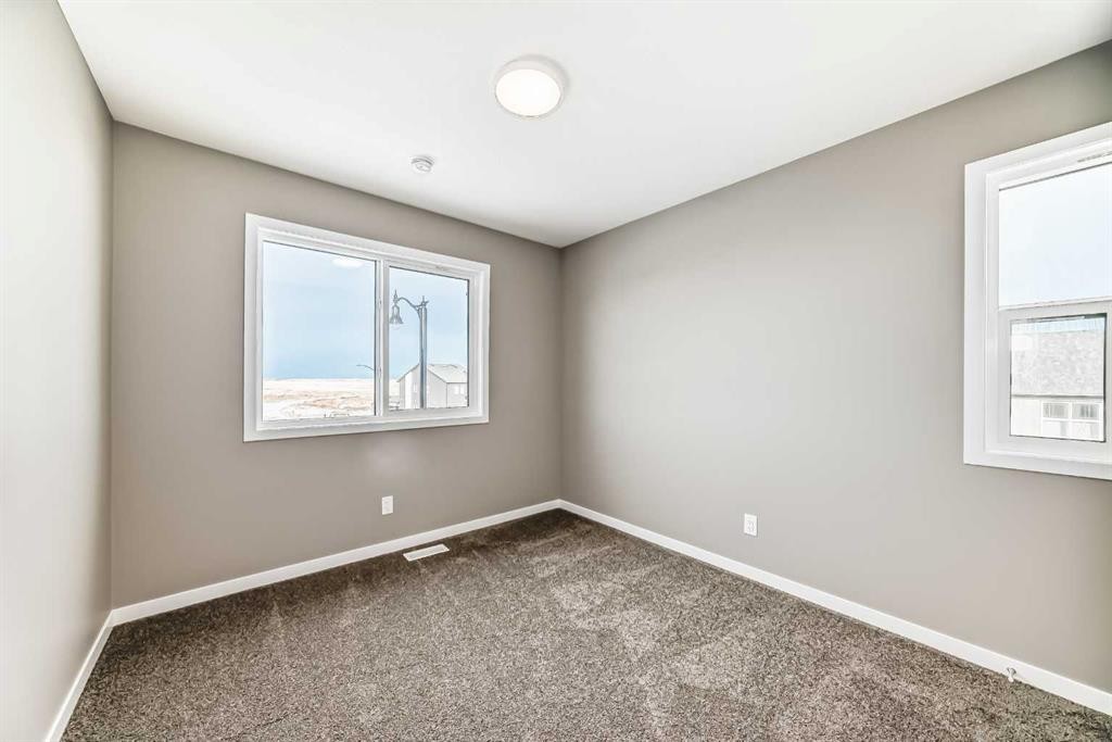 155 Sawgrass Gate Nw, Airdrie, AB - Indoor Photo Showing Other Room