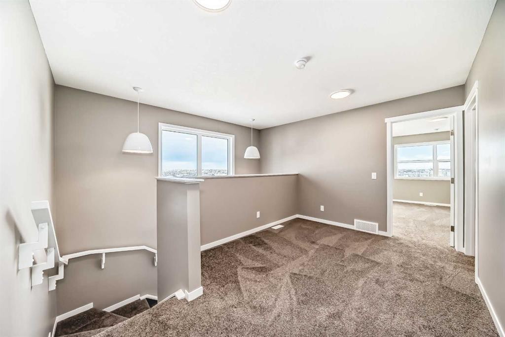 155 Sawgrass Gate Nw, Airdrie, AB - Indoor Photo Showing Other Room