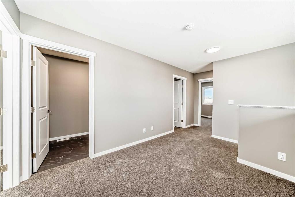 155 Sawgrass Gate Nw, Airdrie, AB - Indoor Photo Showing Other Room