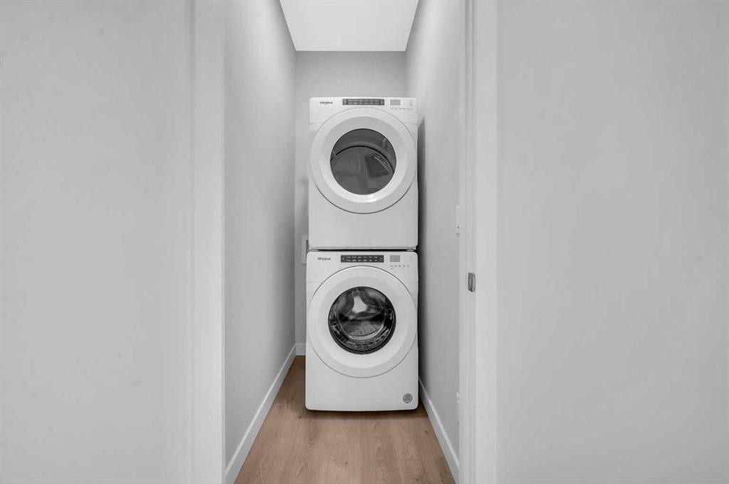 305 Shawnee Square Sw, Calgary, AB - Indoor Photo Showing Laundry Room